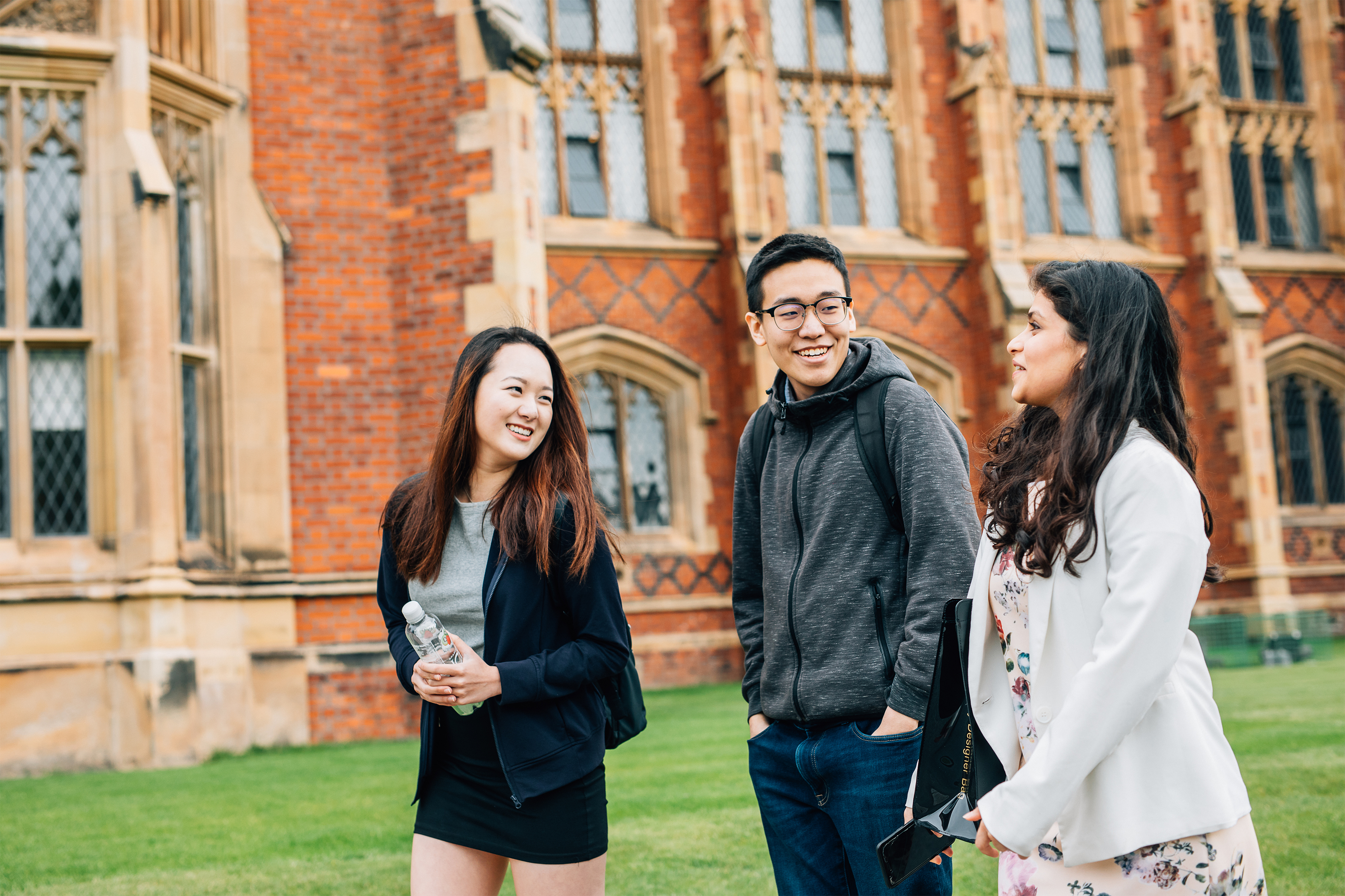Students walking in front of university building