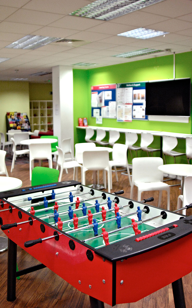 Table football inside the cafe at INTO Manchester