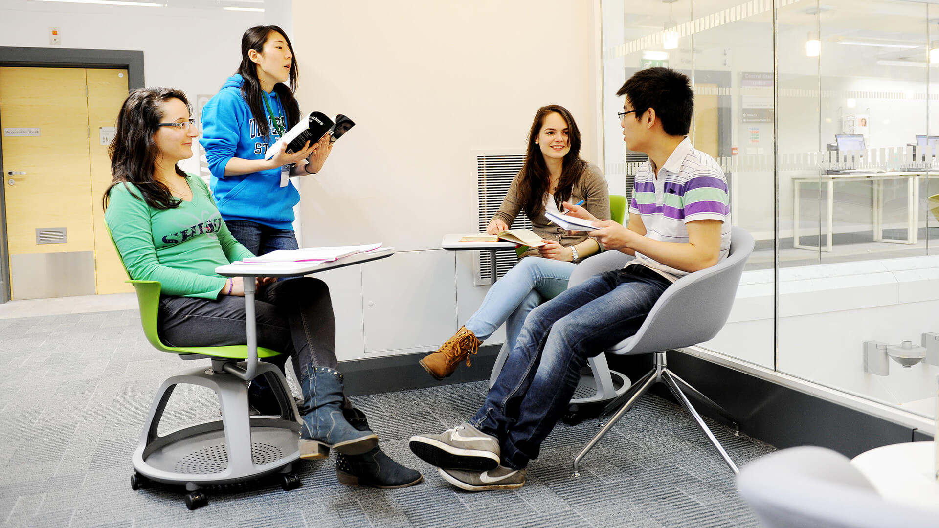 Students studying in the University of Stirling campus library