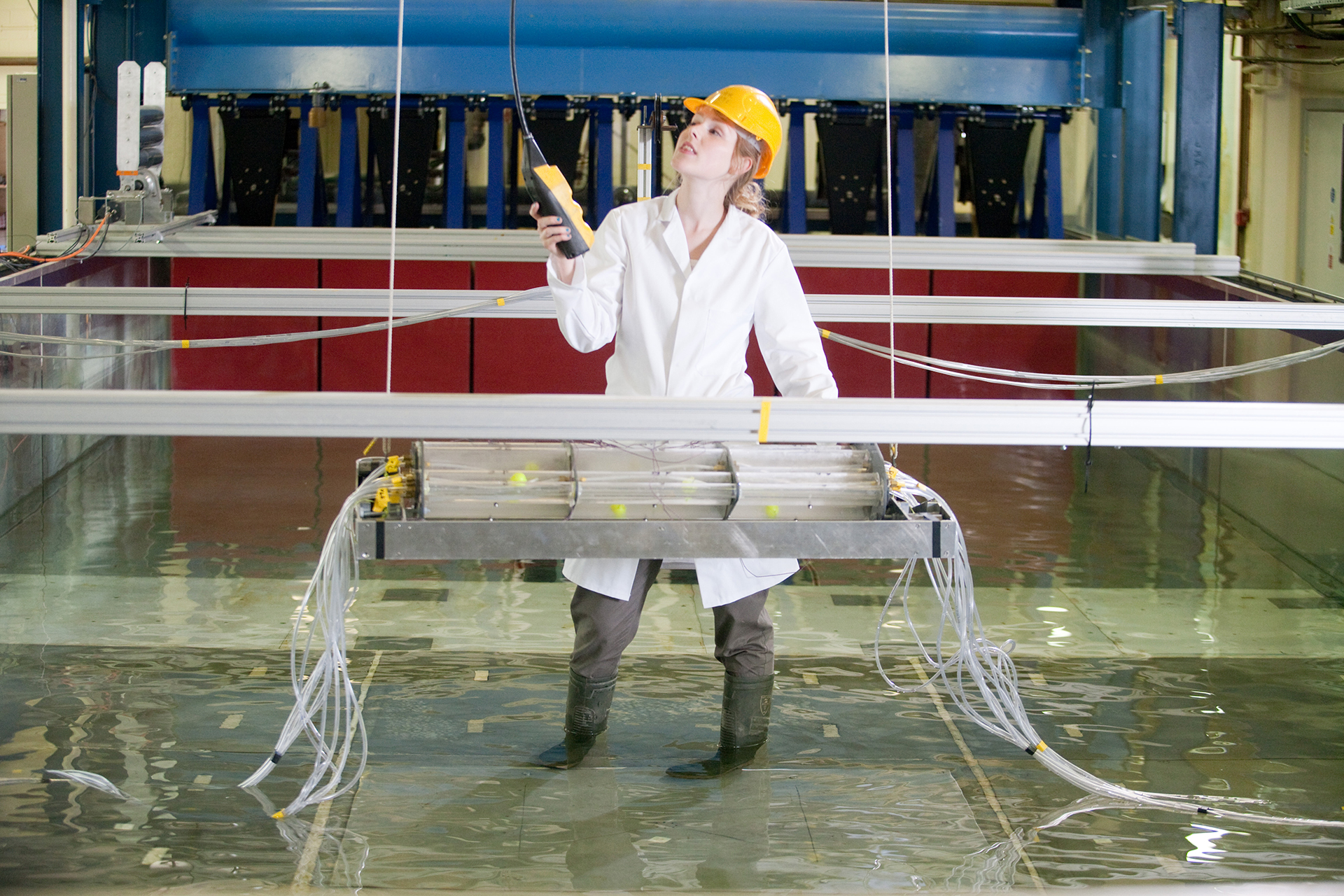 INTO student conducting tests in a water tank