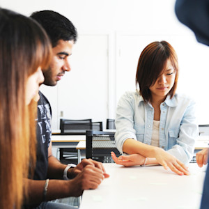 INTO Students carrying out group work INTO Students carrying out group work