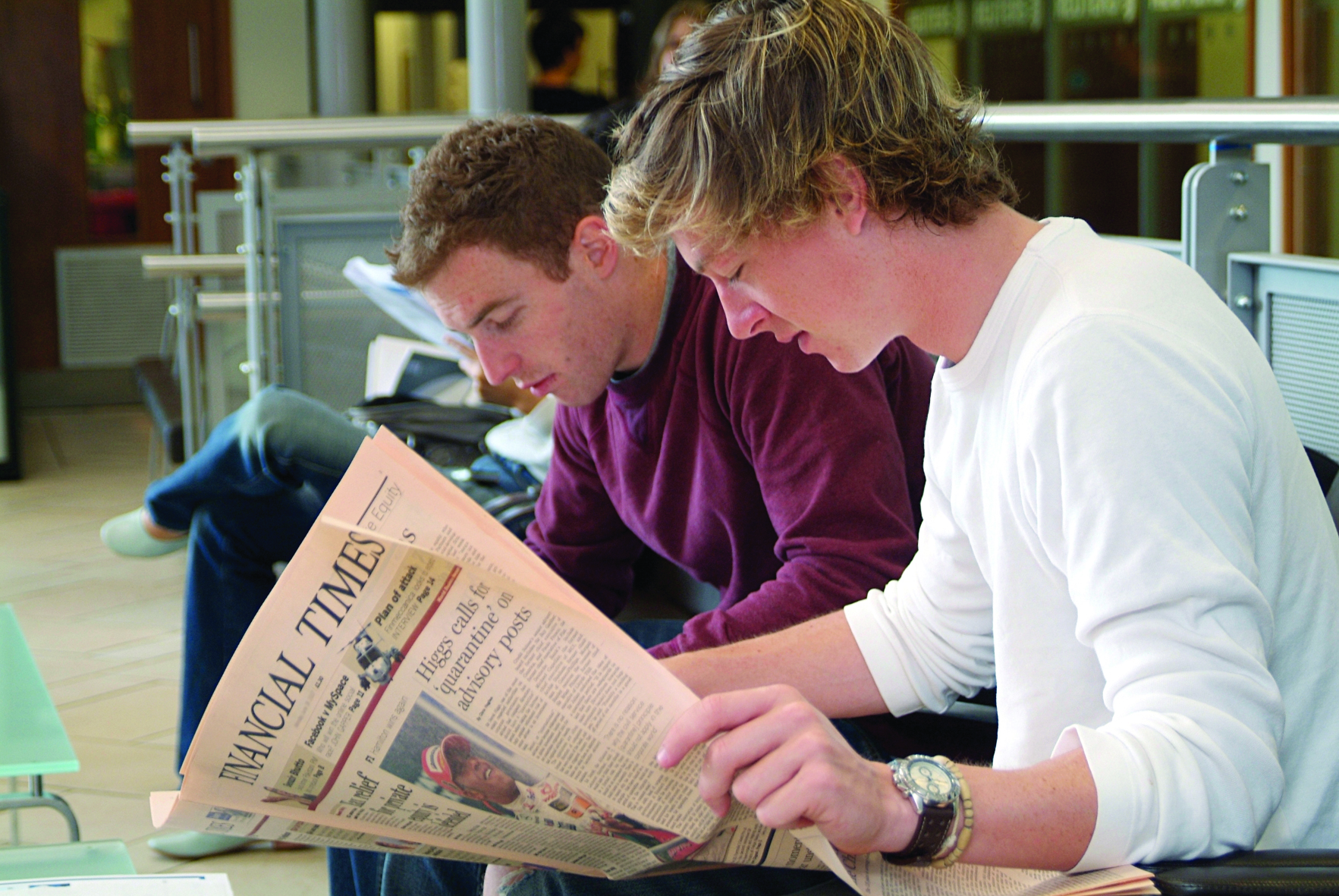 Student reads the Financial Times at University of Exeter