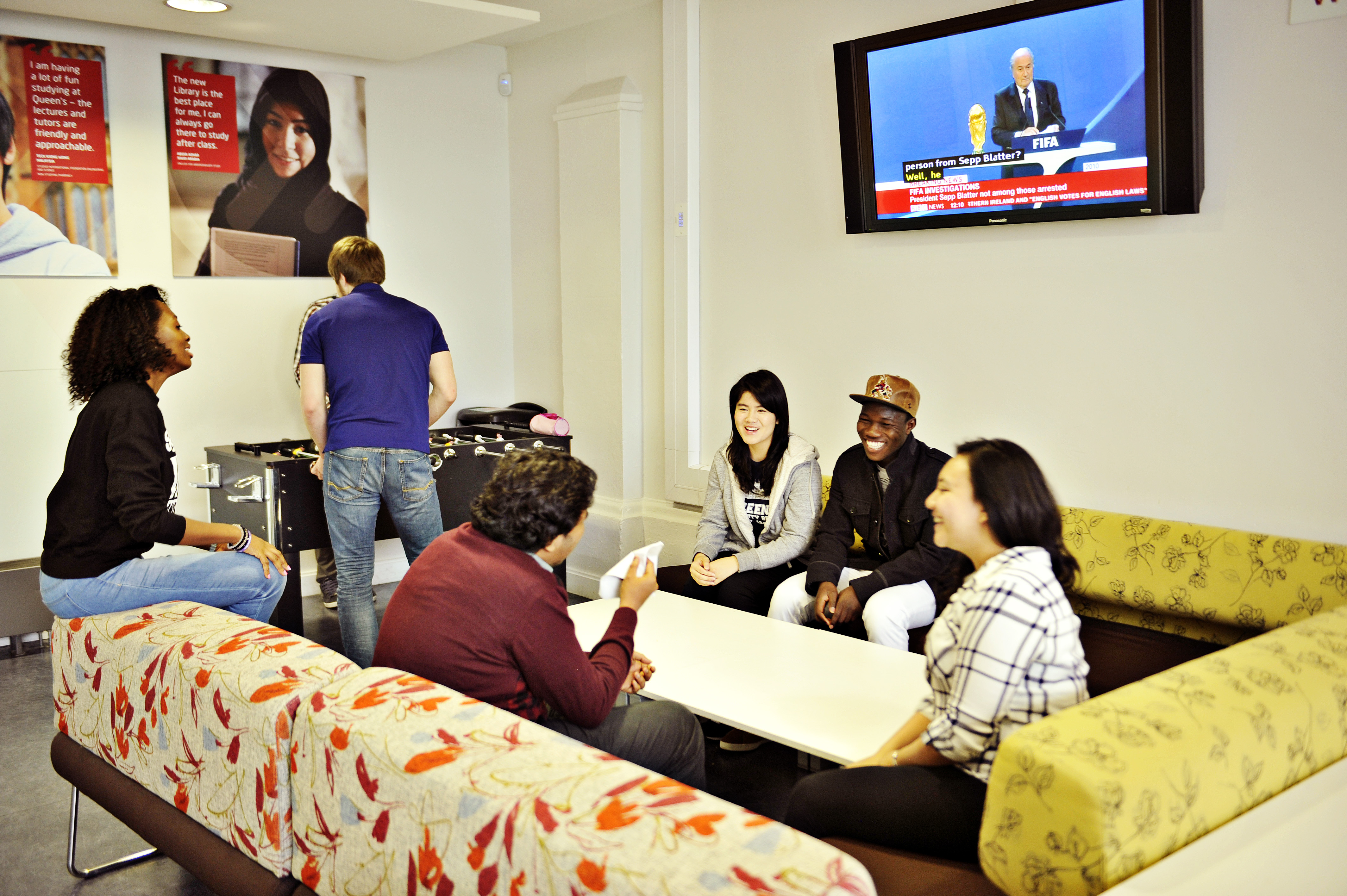 Group of international students in breakout area in the INTO centre