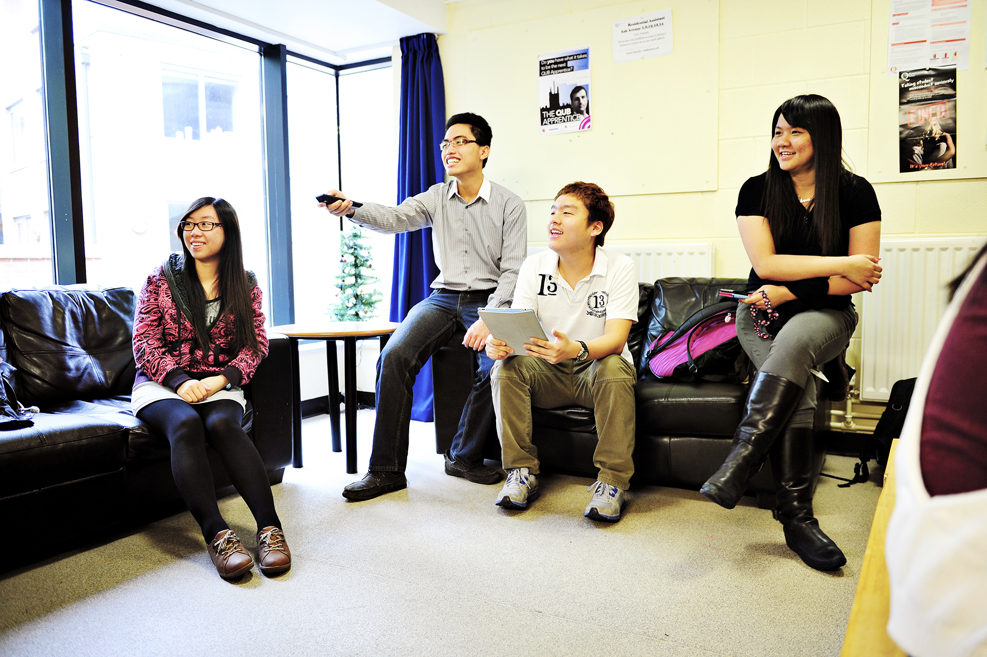 International students socialising in the lounge area in Willow Walk student residences