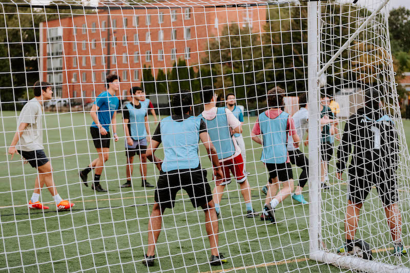 Students playing soccer