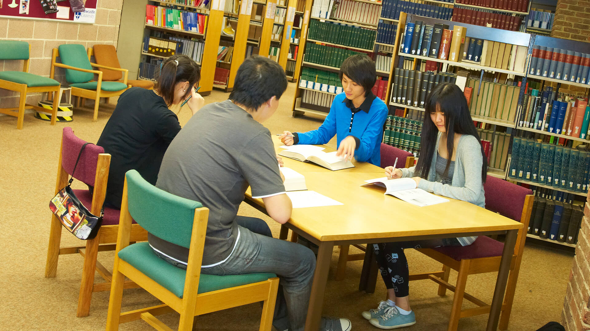 Students in a study group in Newcastle University's library