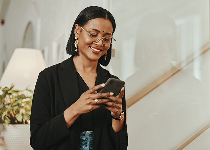 young entrepreneur businesswoman using a smartphone in a modern office