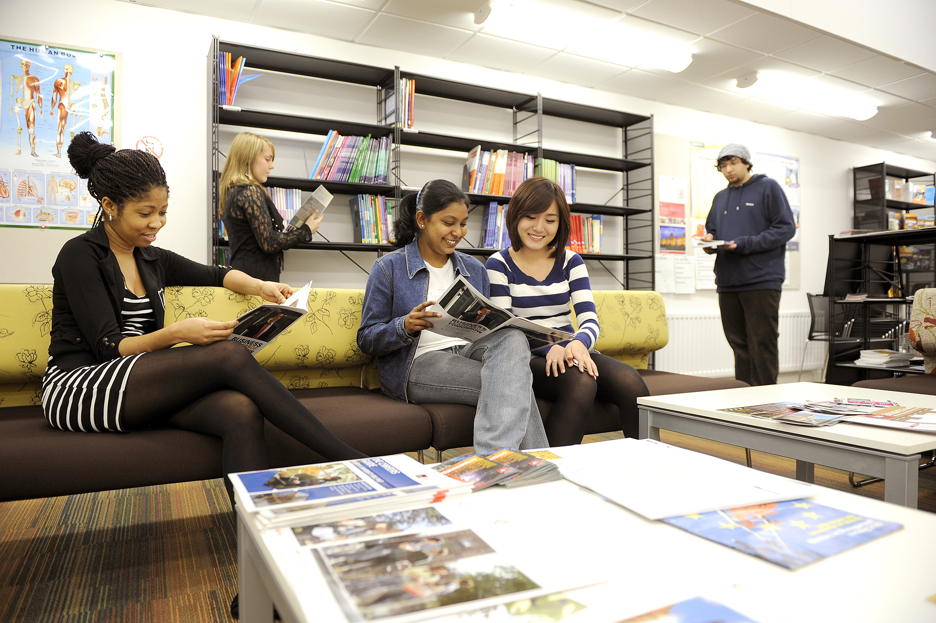 International students reading in INTO Centre Learning Resources Centre