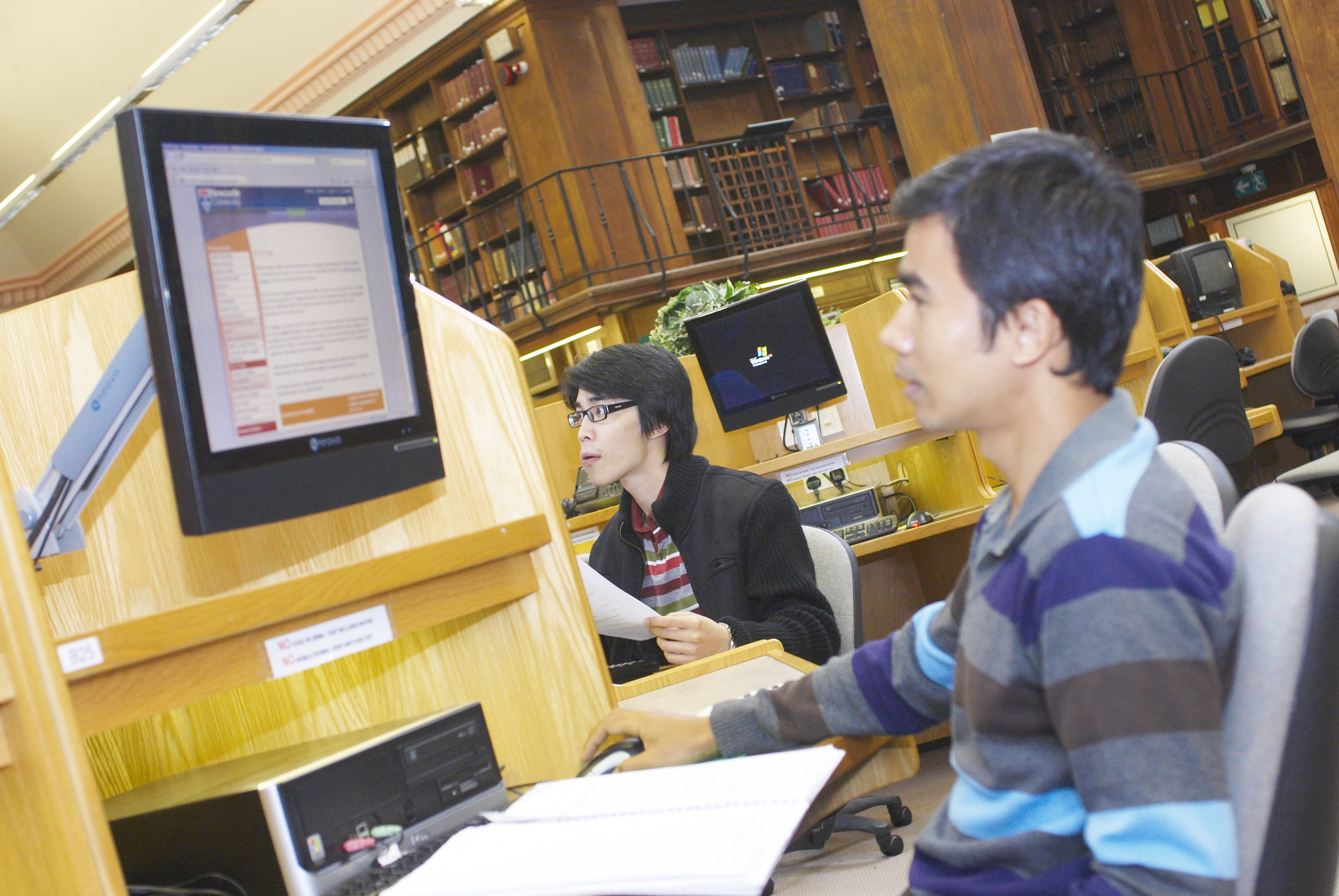 Students working on computer in Newcastle University Old Library Building