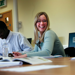 International student laughs during class at University of Exeter International student laughs during class at University of Exeter