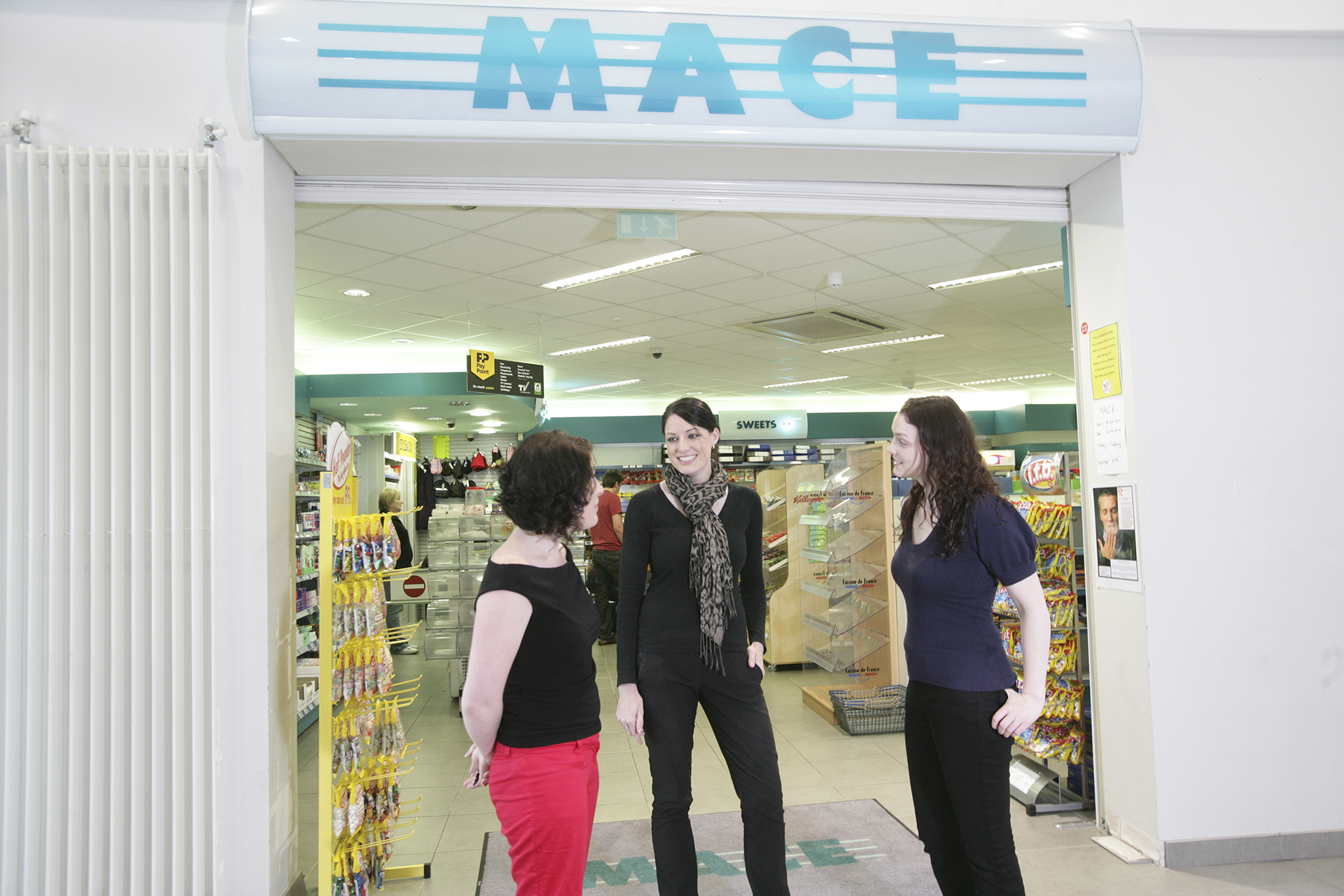 International students outside Mace grocery store