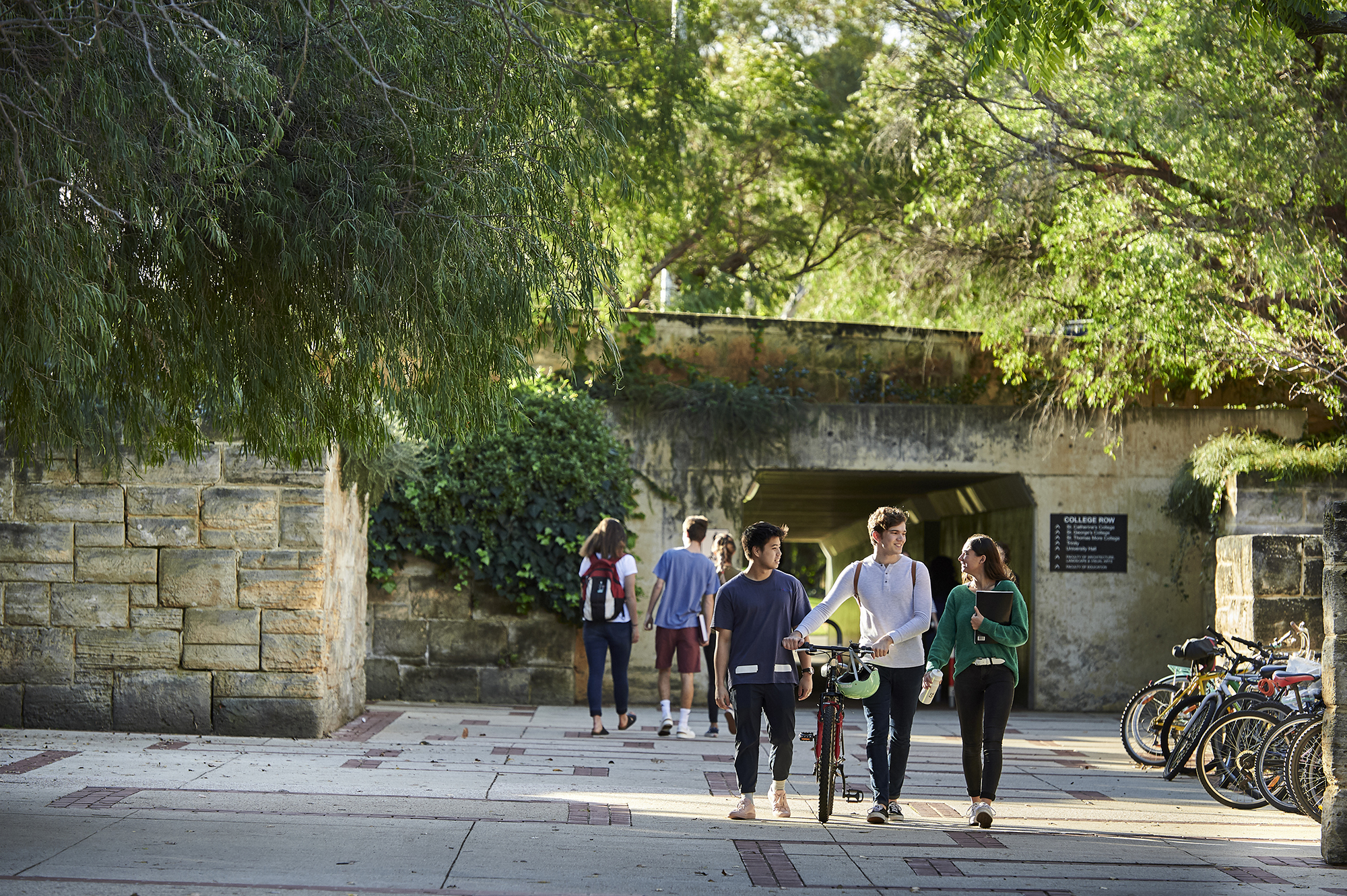 UWA Residential Colleges - Students walking near underpass
