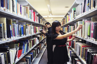 Students using library facilities at Manchester Metropolitan University