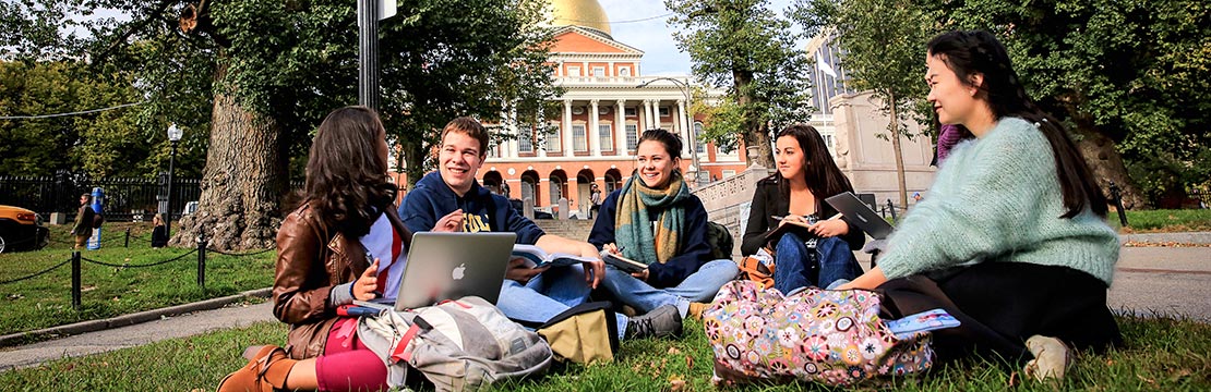 Students studying outside on campus in the US.